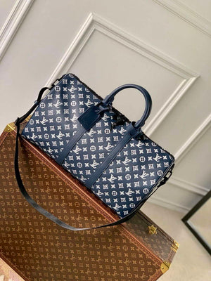 LV M24953 Louis Vuitton Keepall Bandouliere 50 Travel Bag Ink Blue/White - Default Title - View 1