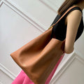 LV M24974 Louis Vuitton Low Key Hobo MM Handbag Cognac Brown - Default Title - View 1