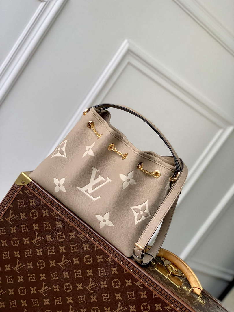 LV M25453 Louis Vuitton LV Bundle Bag Monogram Empreinte Leather Grey/Cream - Default Title - View 1