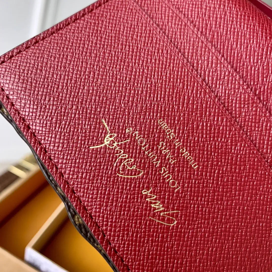 LV M25732 Louis Vuitton Travels With Grace Coddington Pawket Purse