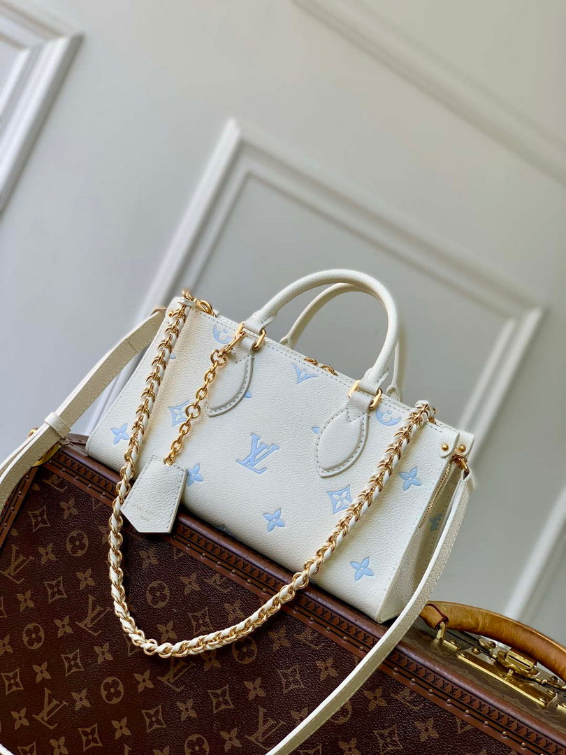 LV M27577 Louis Vuitton OnTheGo East West Bag Milky White/Blue