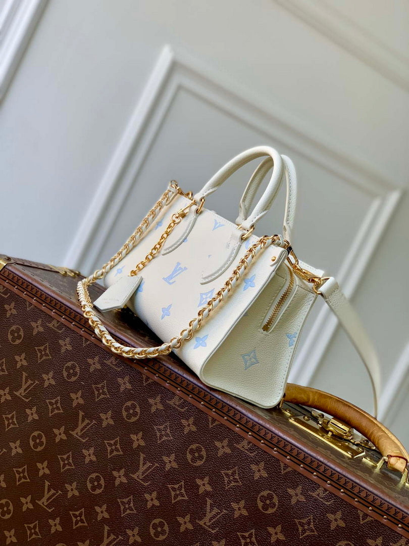 LV M27577 Louis Vuitton OnTheGo East West Bag Milky White/Blue