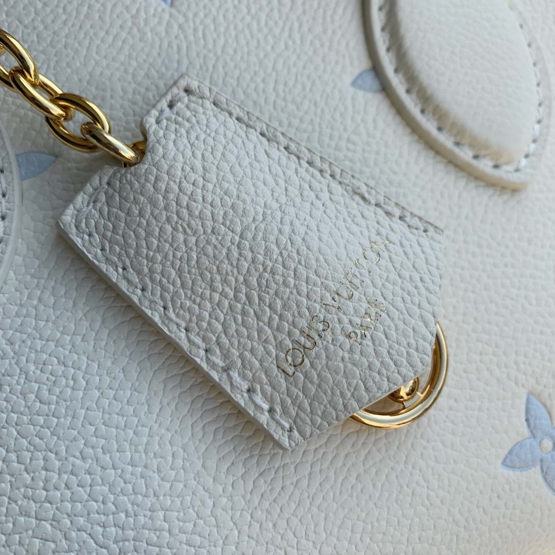 LV M27577 Louis Vuitton OnTheGo East West Bag Milky White/Blue
