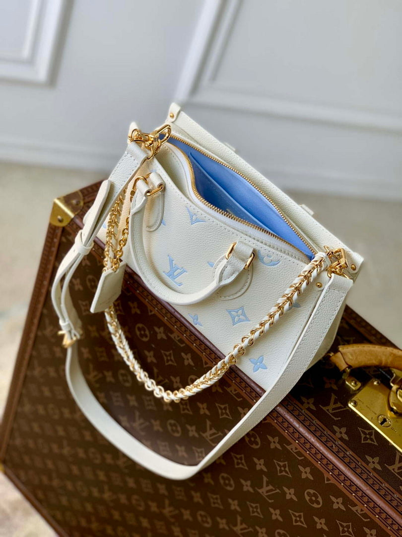 LV M27577 Louis Vuitton OnTheGo East West Bag Milky White/Blue