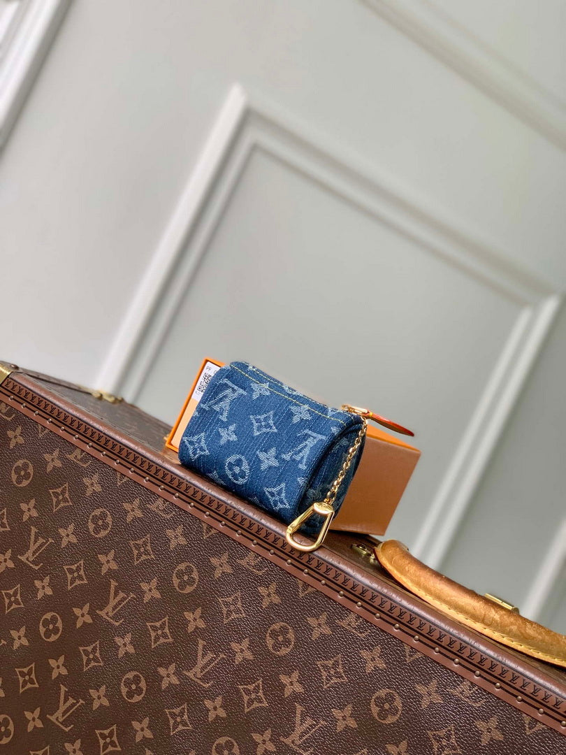 LV M27604 Louis Vuitton Trousse Speedy Blue Denim