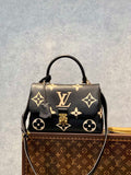 LV M45978 Louis Vuitton Madeleine MM Bicolor Monogram Empreinte Leather Black