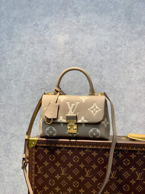 LV M46008 Louis Vuitton Madeleine BB Handbag Monogram Empreinte Leather - Default Title - View 1