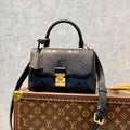 LV M46008 Louis Vuitton Madeleine BB Monogram Empreinte Leather Black - Default Title - View 1
