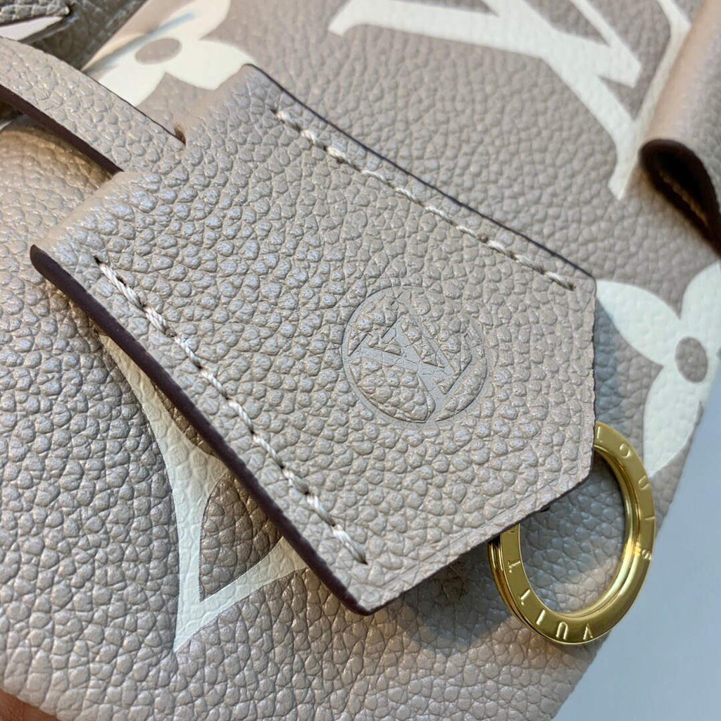 LV M46041 Louis Vuitton Madeleine MM Handbag Embossed Grained Cowhide Leather