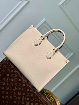 LV M46531 Louis Vuitton OnTheGo MM Bag Monogram Empreinte Beige - Default Title - View 1