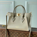 LV M57729 Louis Vuitton On My Side PM Tote Bag Beige - Default Title - View 1