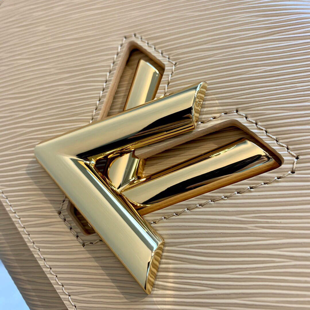 LV M59884 Louis Vuitton Twist MM Handbag skin color
