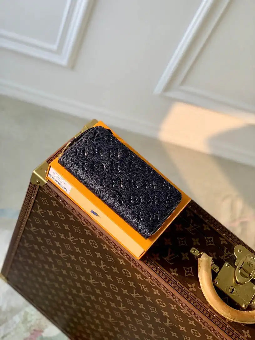 LV M61864 Louis Vuitton Zippy Wallet Blue Monogram Empreinte