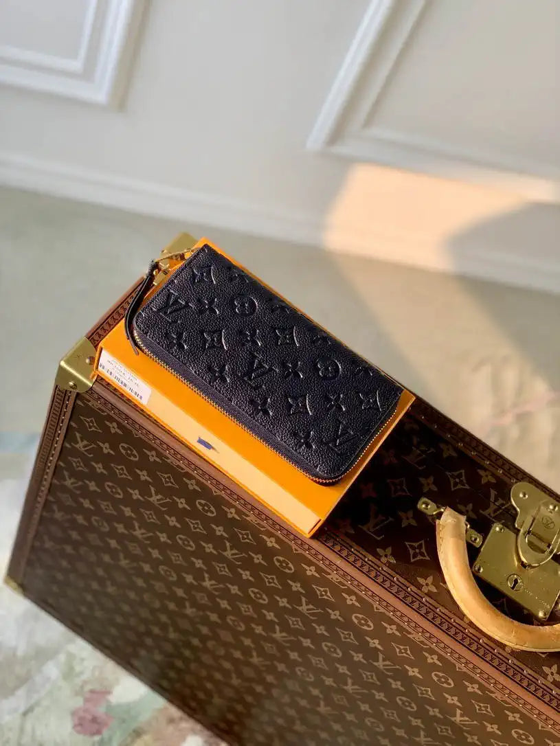 LV M61864 Louis Vuitton Zippy Wallet Blue Monogram Empreinte