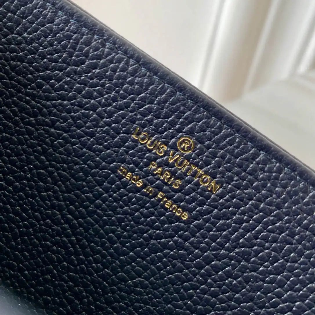 LV M61864 Louis Vuitton Zippy Wallet Blue Monogram Empreinte