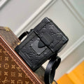 LV M82077 Louis Vuitton Vertical Trunk Wearable Wallet black embossed - Default Title - View 1