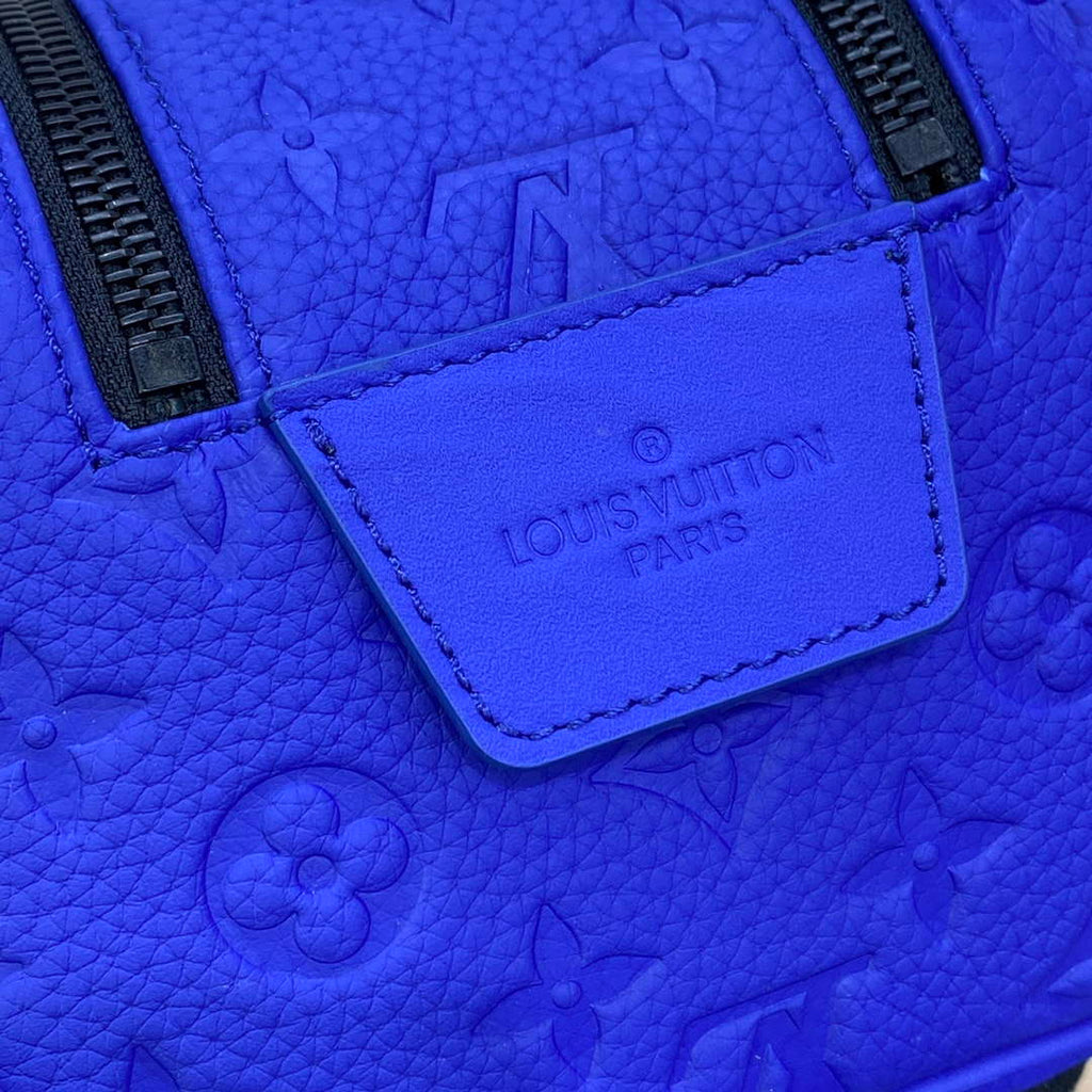 LV M82576 Louis Vuitton Dopp Kit Bag Racing Blue