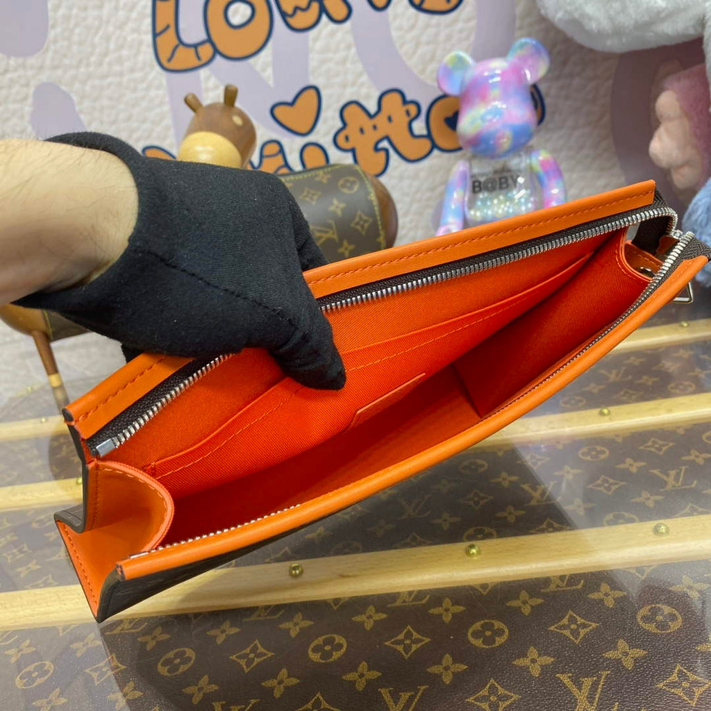 LV M82855 Louis Vuitton Pochette Voyage MM Bag Orange