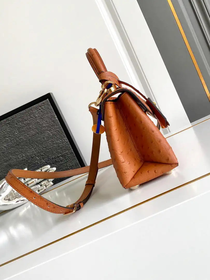 LV M87106 Louis Vuitton Ostrich Rose Des Vents Mini Brown