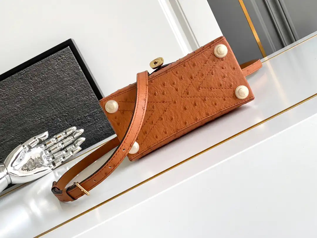 LV M87106 Louis Vuitton Ostrich Rose Des Vents Mini Brown