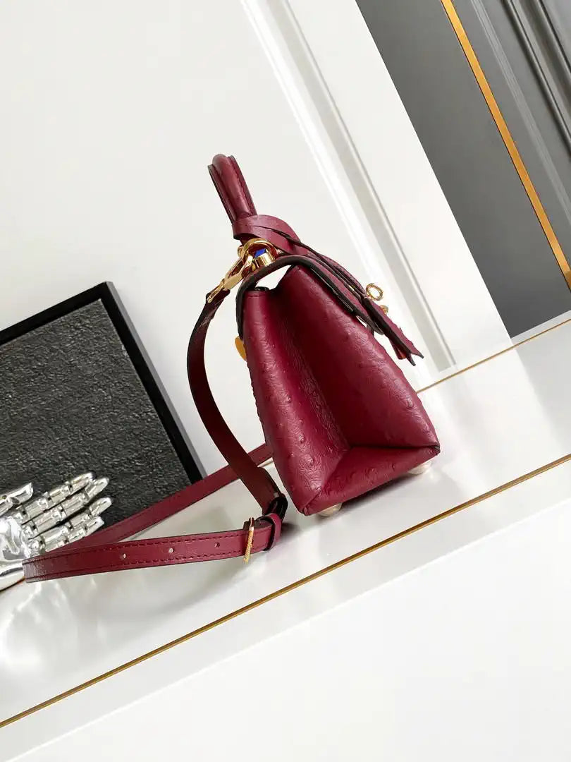 LV M87106 Louis Vuitton Ostrich Rose Des Vents Mini Wine Red
