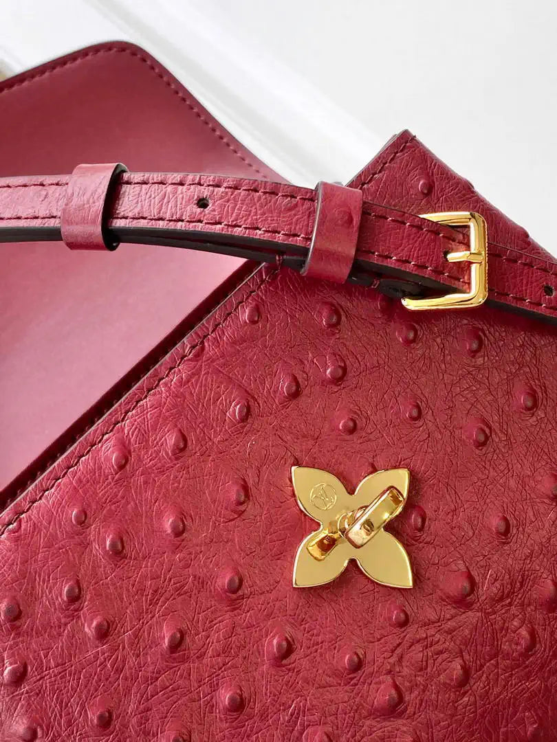 LV M87106 Louis Vuitton Ostrich Rose Des Vents Mini Wine Red