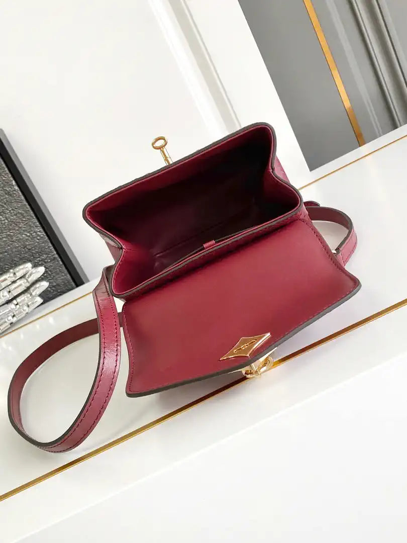 LV M87106 Louis Vuitton Ostrich Rose Des Vents Mini Wine Red
