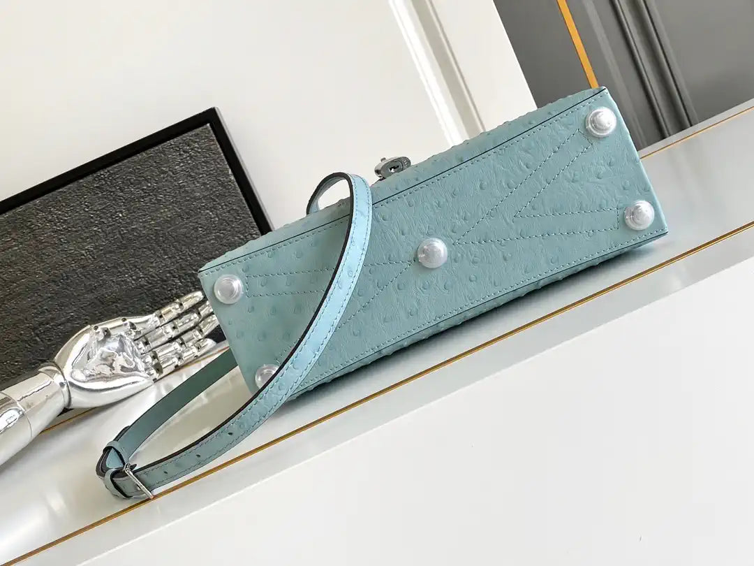 LV M87107 Louis Vuitton Ostrich Rose Des Vents MM Light Blue