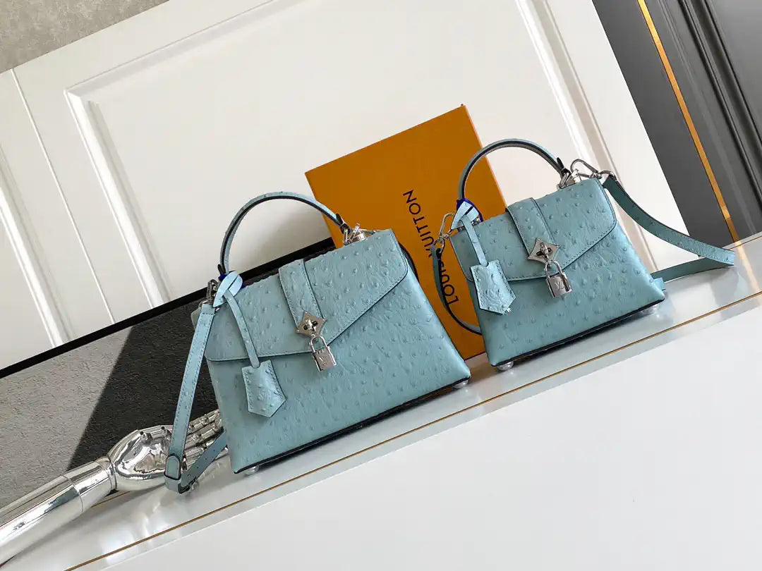 LV M87107 Louis Vuitton Ostrich Rose Des Vents MM Light Blue