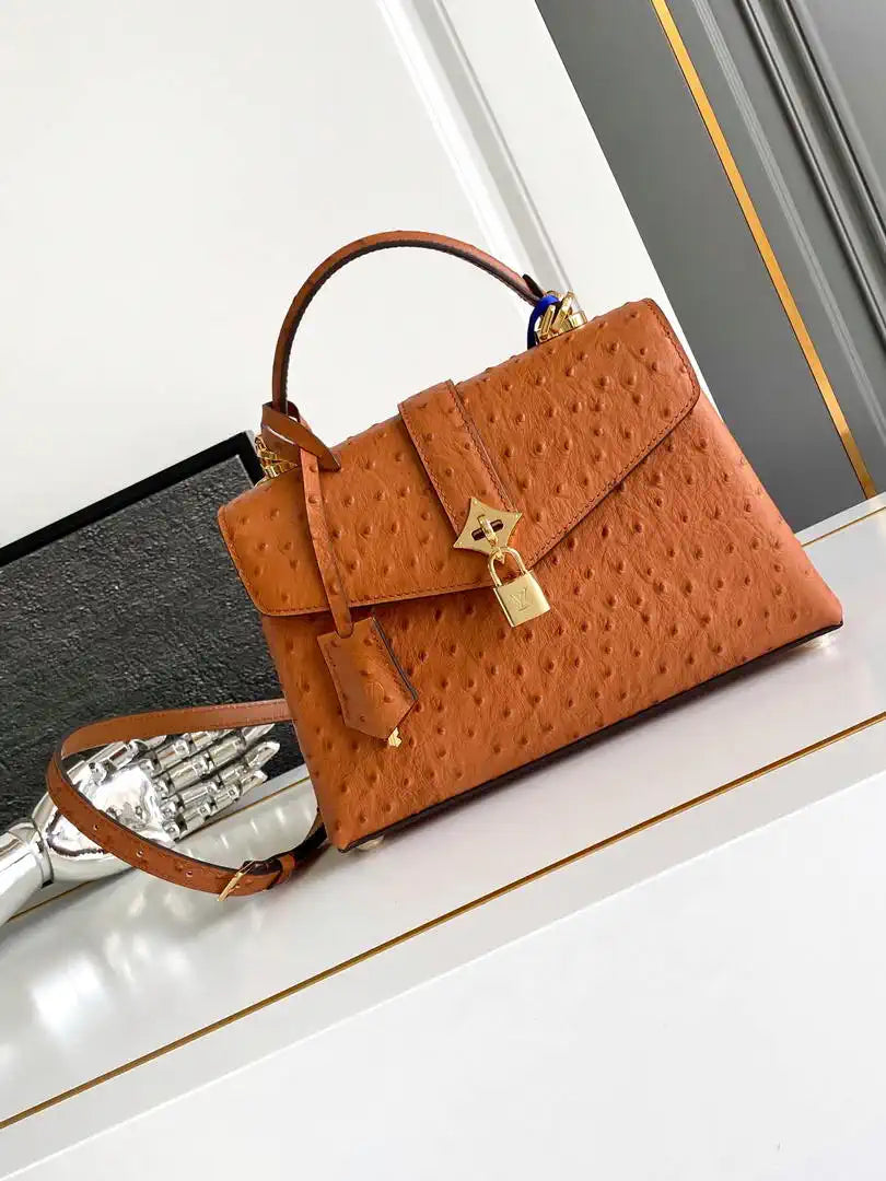 LV M87107 Louis Vuitton Ostrich Rose Des Vents MM Brown
