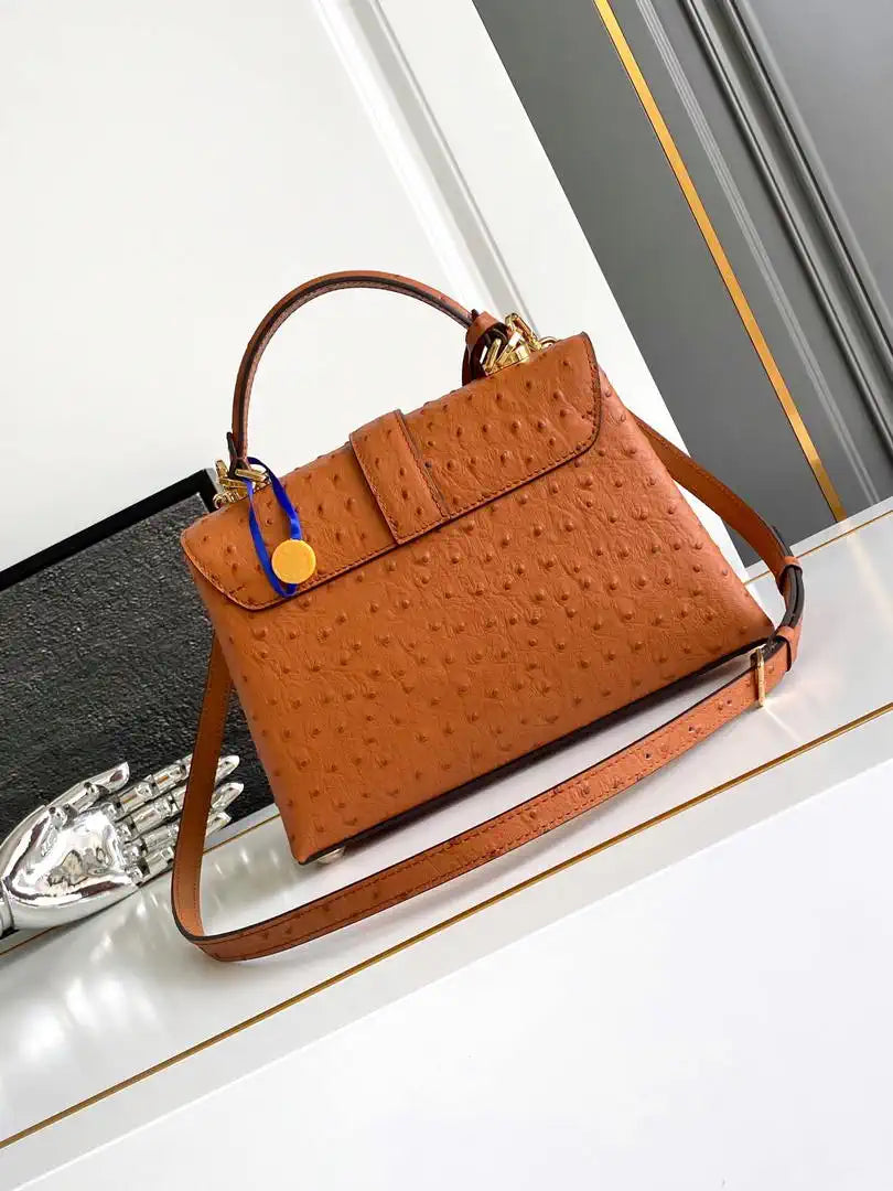 LV M87107 Louis Vuitton Ostrich Rose Des Vents MM Brown