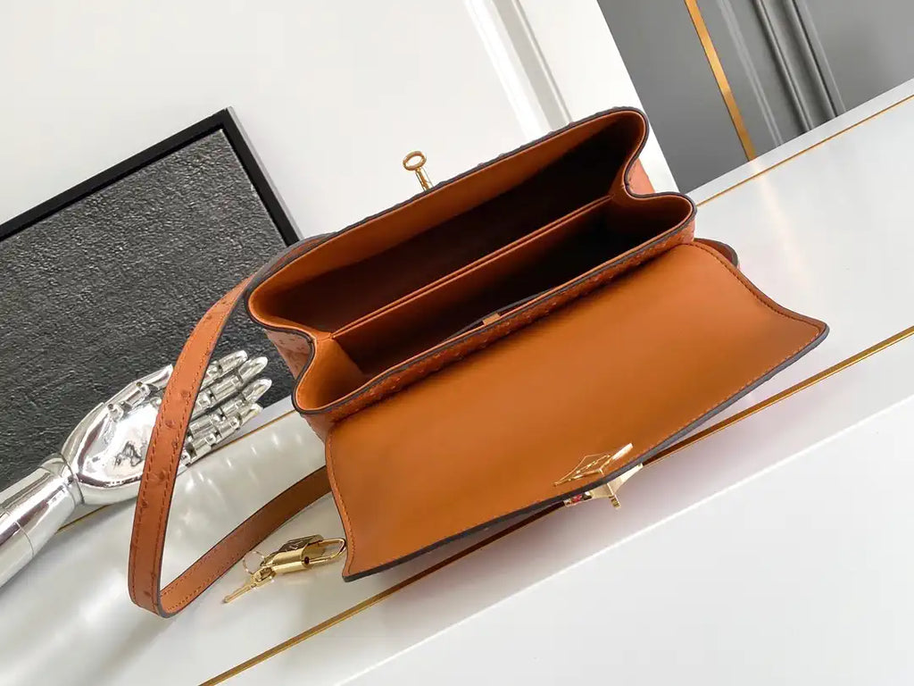 LV M87107 Louis Vuitton Ostrich Rose Des Vents MM Brown