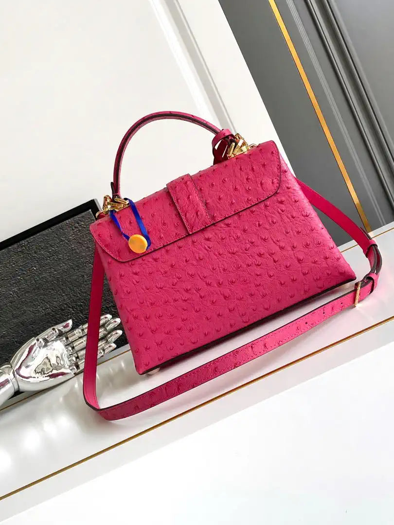 LV M87107 Louis Vuitton Ostrich Rose Des Vents MM Rose Red