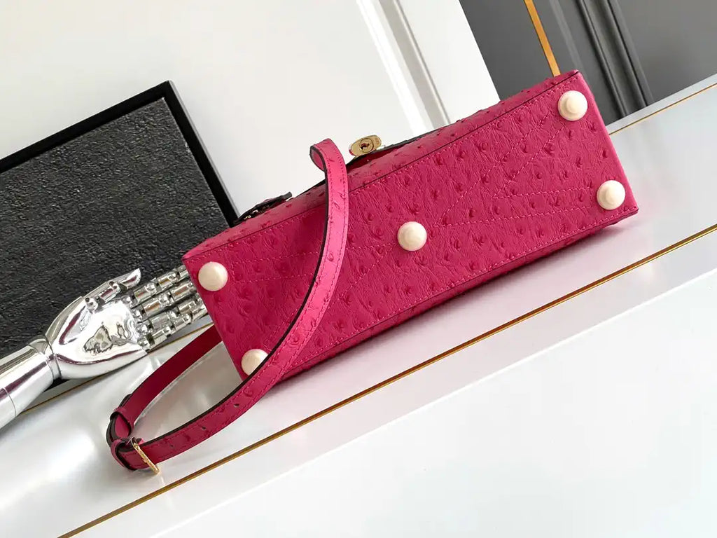 LV M87107 Louis Vuitton Ostrich Rose Des Vents MM Rose Red