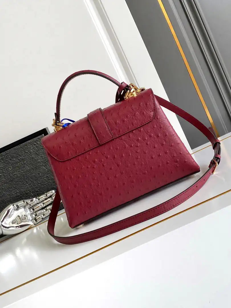 LV M87107 Louis Vuitton Ostrich Rose Des Vents MM Wine red