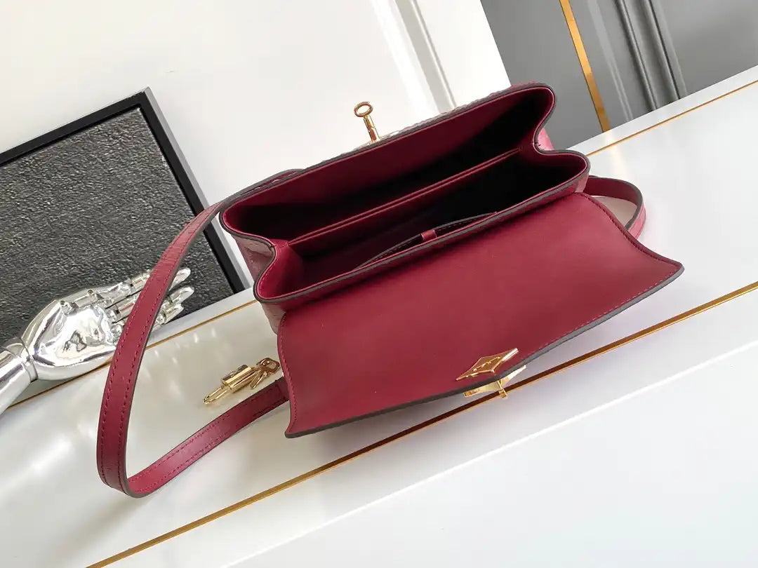 LV M87107 Louis Vuitton Ostrich Rose Des Vents MM Wine red