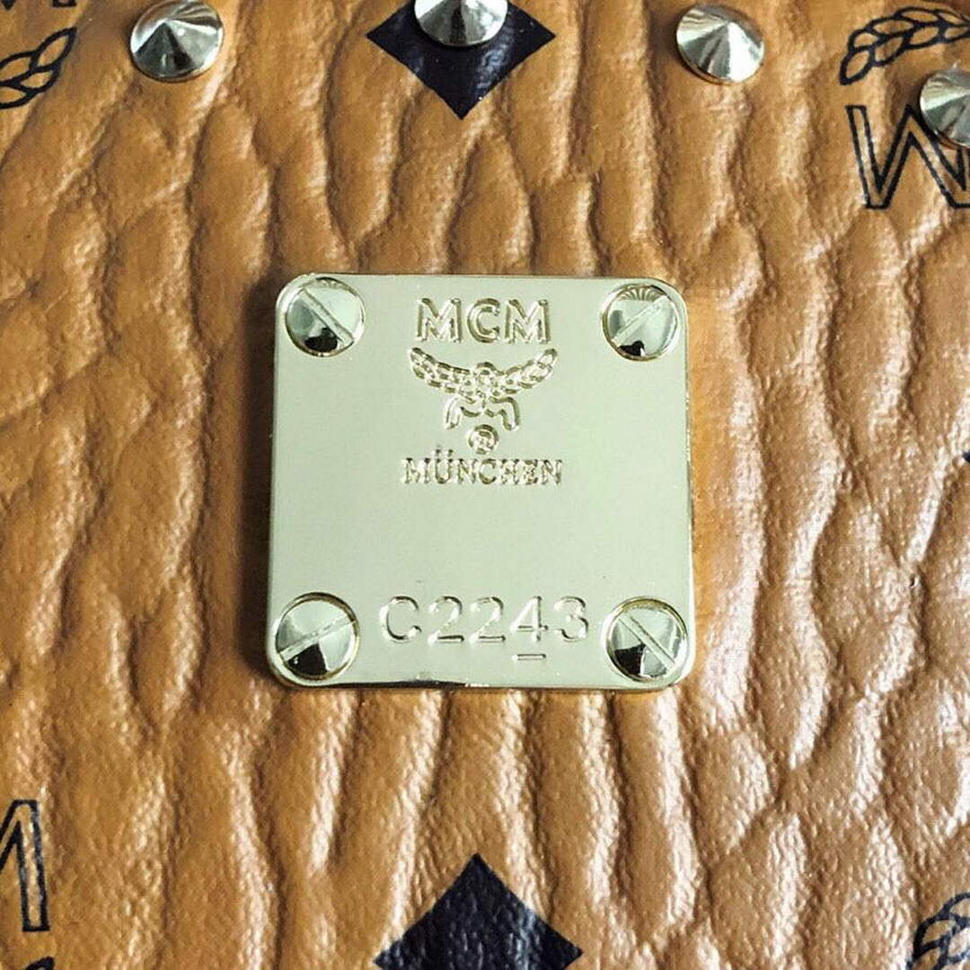 MCM MMK6SVE92CO001 27cm Stark Rivet backpack in Visetos
