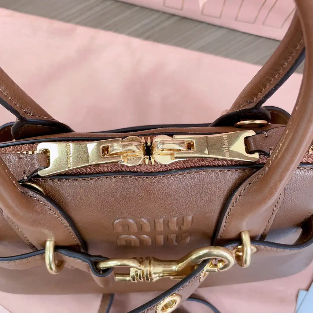 MiuMiu 5BB169 Aventure nappa leather top-handle bag Brown