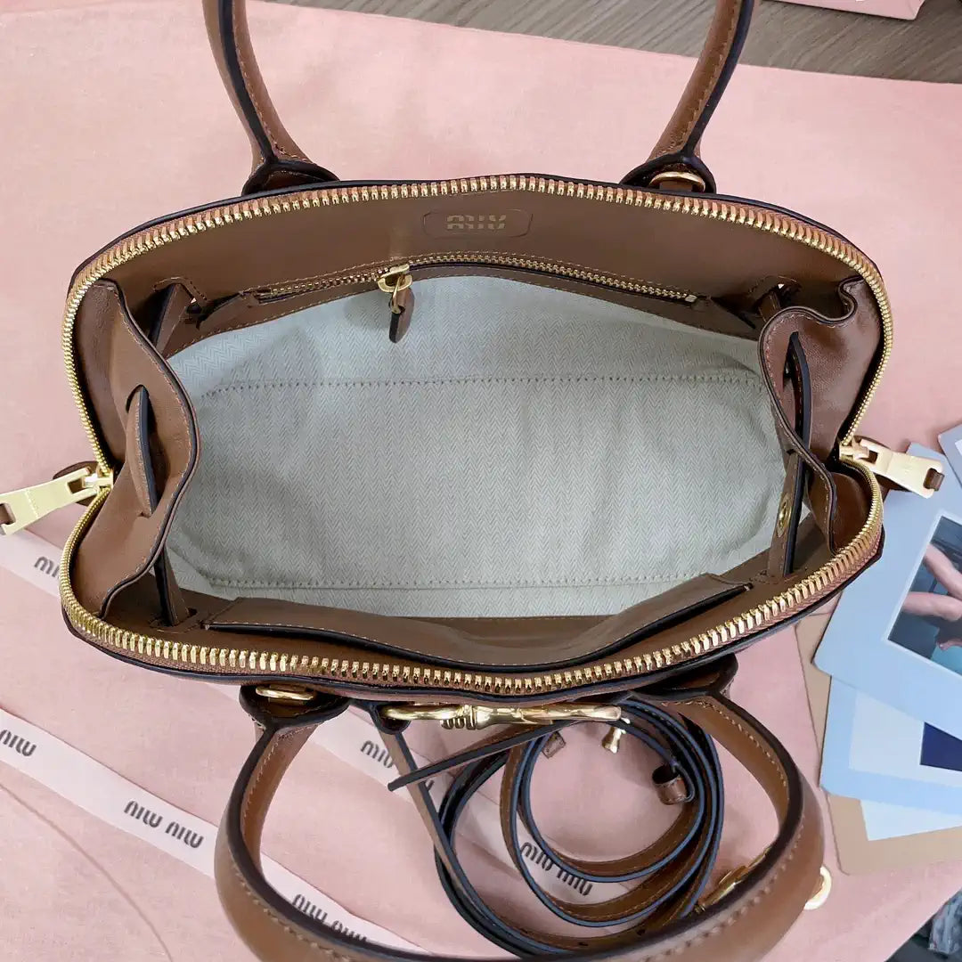 MiuMiu 5BB169 Aventure nappa leather top-handle bag Brown