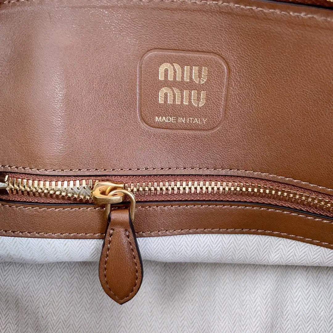MiuMiu 5BB169 Aventure nappa leather top-handle bag Brown