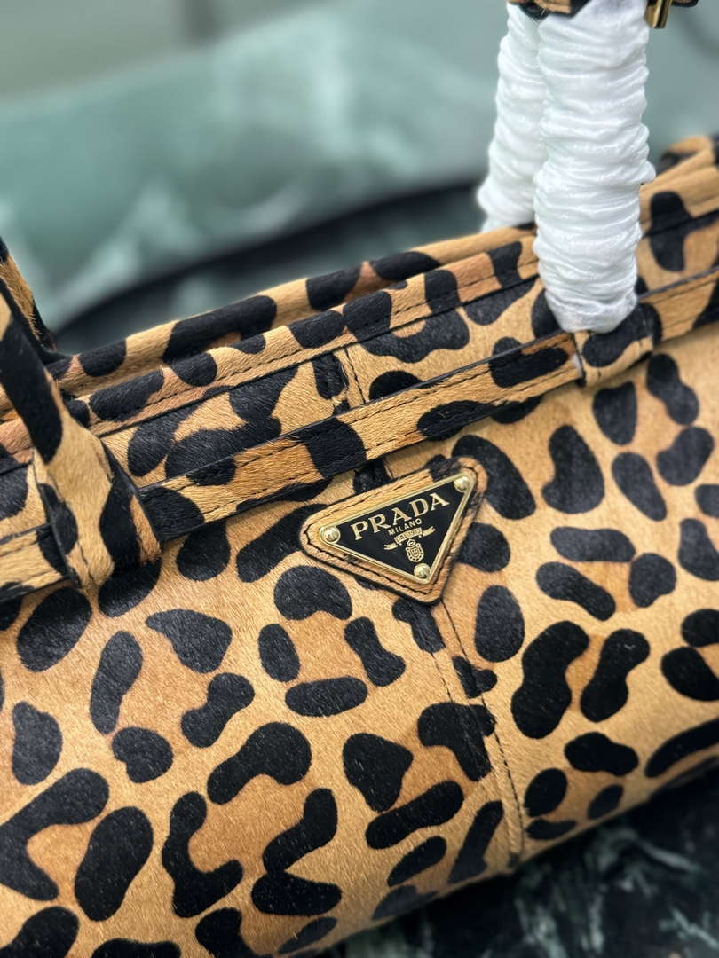 Prada 1BA426 Medium printed leather handbag Honey