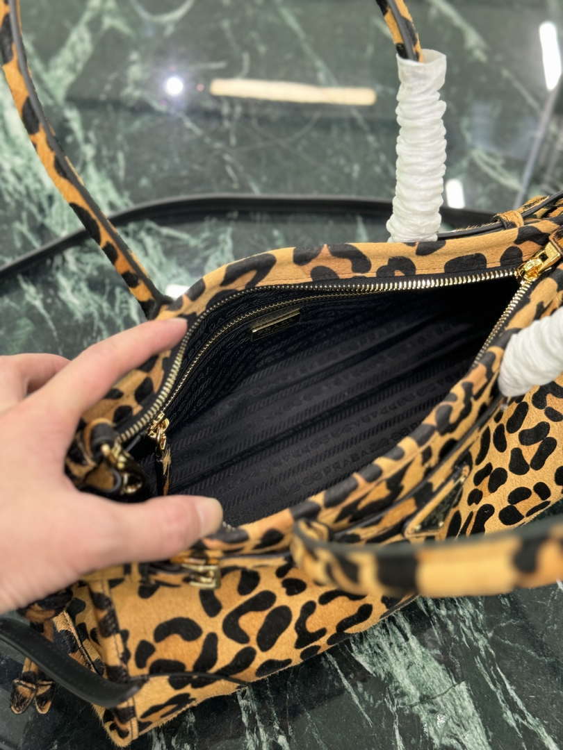 Prada 1BA426 Medium printed leather handbag Honey