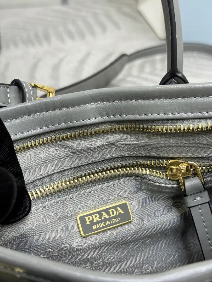 Prada 1BA486 Bonnie leather mini handbag Gray
