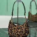 Prada 1BC204 Prada Re-Edition printed leather mini-bag Honey - Default Title - View 1