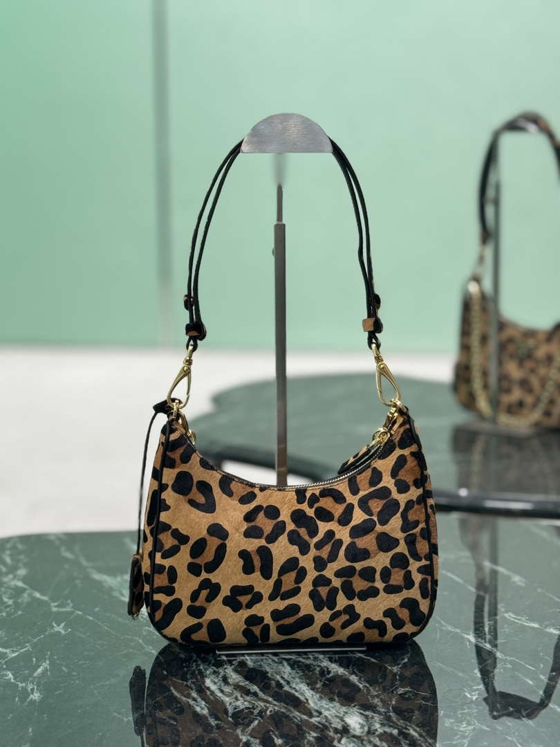 Prada 1BC204 Prada Re-Edition printed leather mini-bag Honey