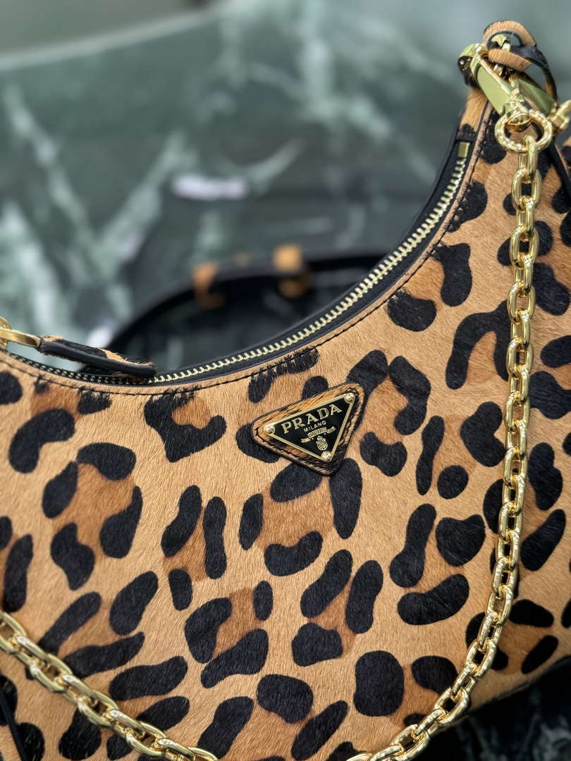 Prada 1BC204 Prada Re-Edition printed leather mini-bag Honey