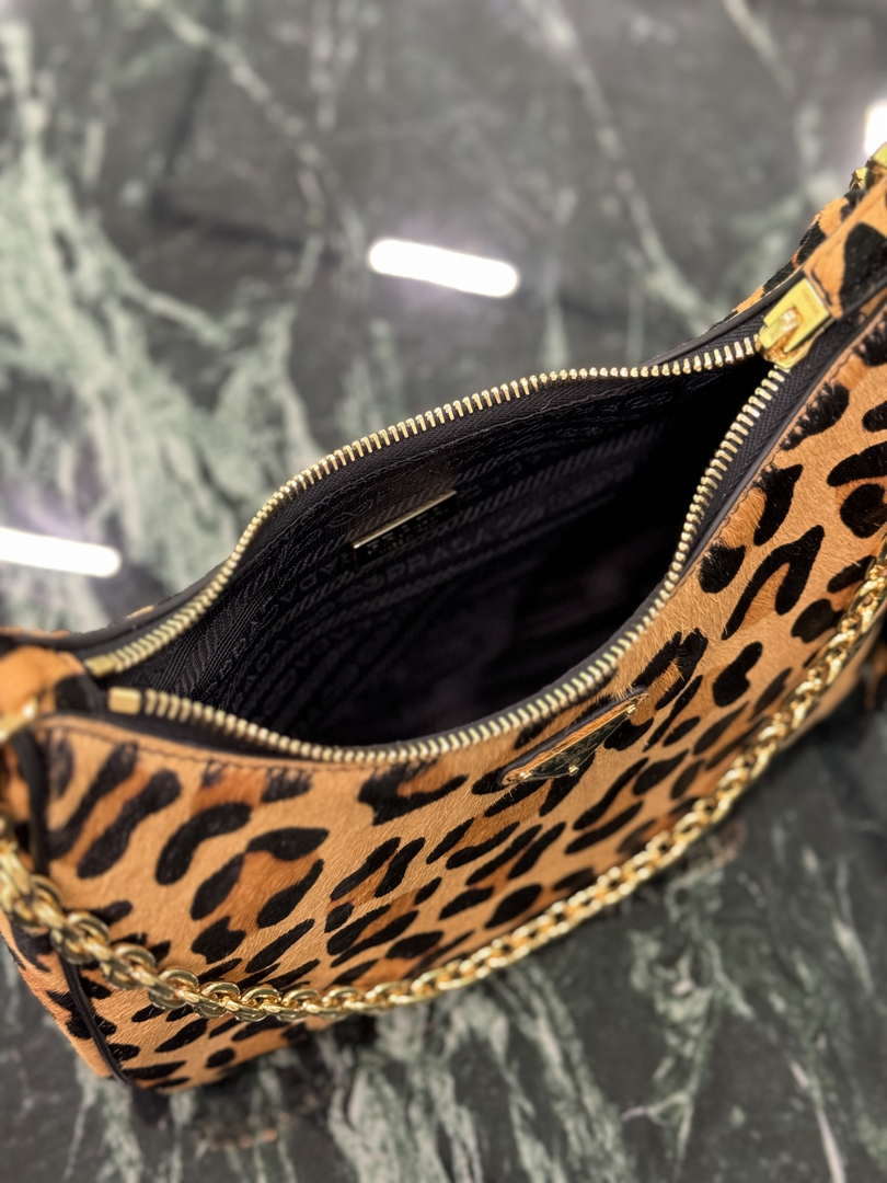 Prada 1BC204 Prada Re-Edition printed leather mini-bag Honey