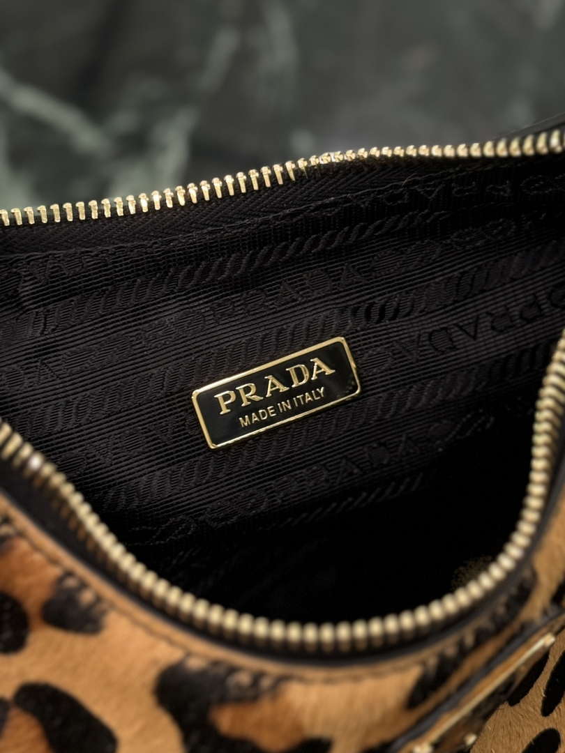Prada 1BC204 Prada Re-Edition printed leather mini-bag Honey