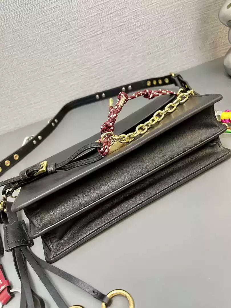 Prada 1BD379 Soft Sound small leather shoulder bag with charms Black