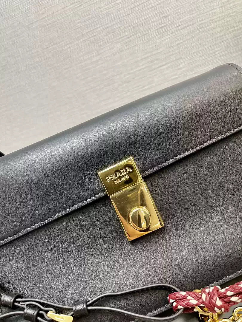 Prada 1BD379 Soft Sound small leather shoulder bag with charms Black